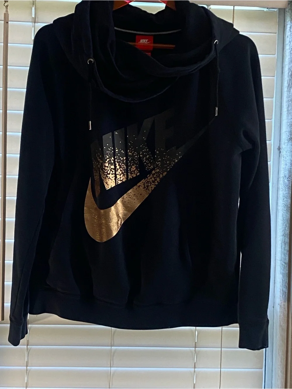 Nike Black Hoodie with Metallic Gold Swoosh Accent